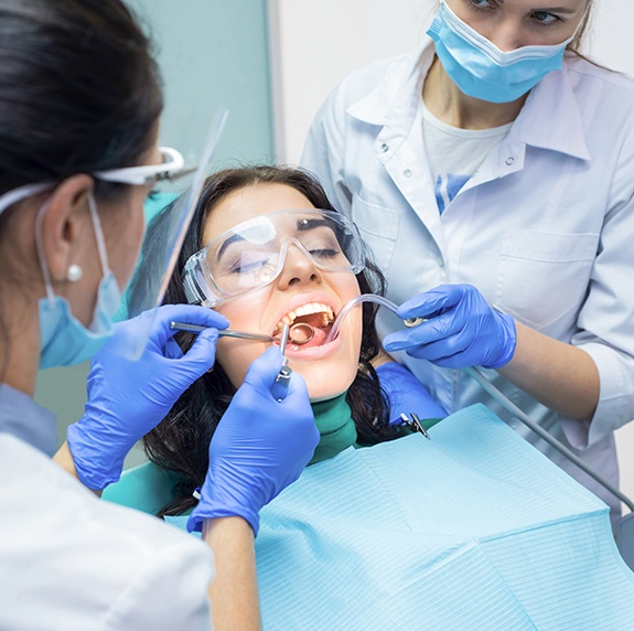 Woman getting a dental procedure