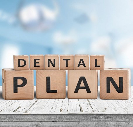 wooden blocks that spell dental plan