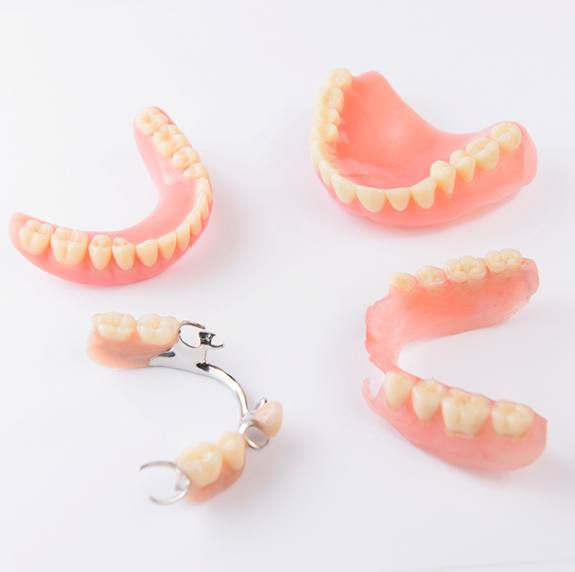 Full and partial dentures with white background
