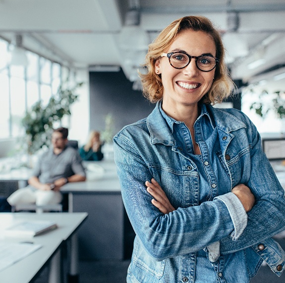 Woman smiling at work with beautiful teeth